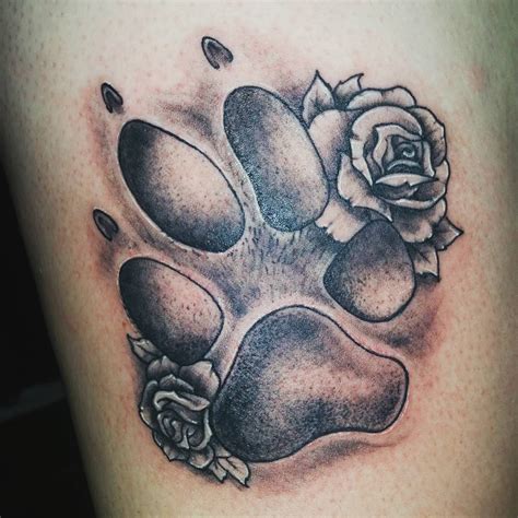 paw print tattoo